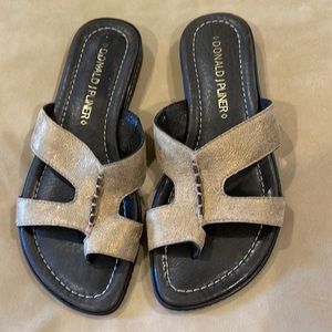 Gold Donald J Pliner toe loop sandals. 5.5M